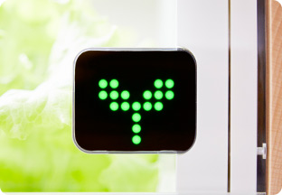 Facial expression icons show the status of vegetables.